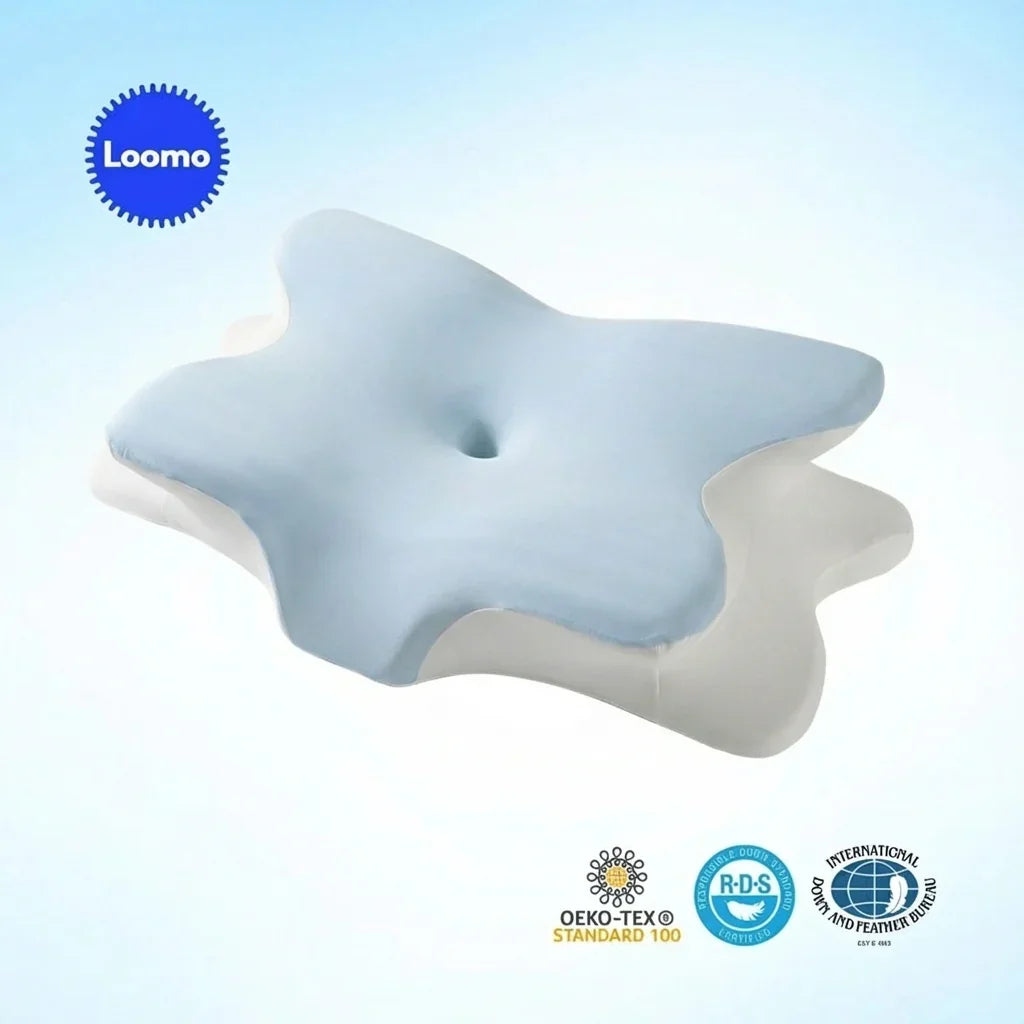 Loomo ergonomic blue and white shaping pillow with certifications on a light blue background