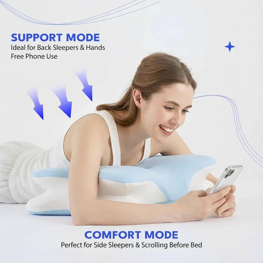Woman lying on stomach using a smartphone, resting on a blue and white support pillow designed for back and side sleepers